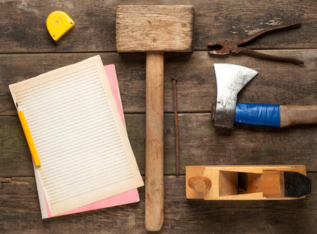 carpenter tools in pine wood table close upの写真素材