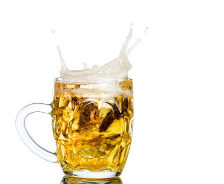 Beer splash in glasses isolated on white.の写真素材