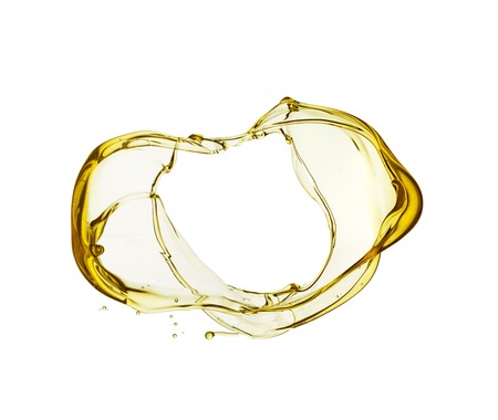 Olive oil splash isolated on white background.の写真素材