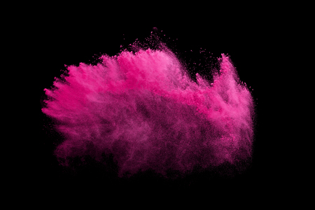 colorful powder splash isolated on black backgroundの写真素材
