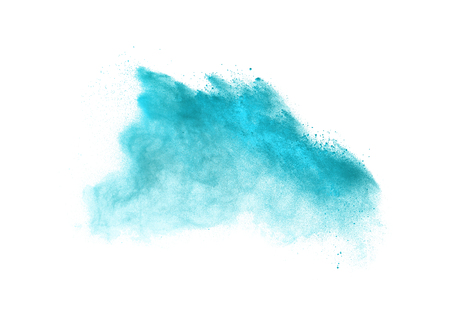 Powder explosion. Closeup of blue dust particle explosion isolated on backgroundの写真素材