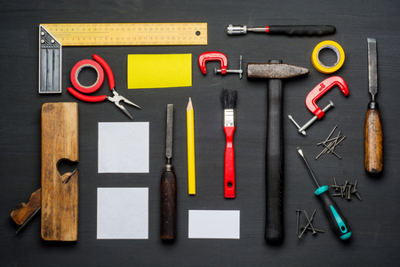 Top view of carpenter tools equipment set on wooden tableの写真素材