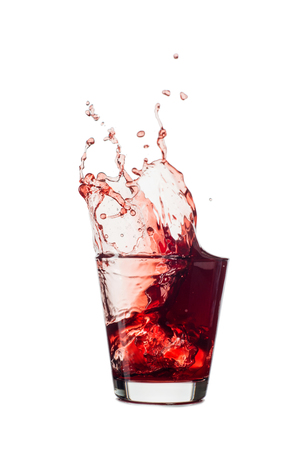blueberries juice splash out of glass isolated on white background.の写真素材