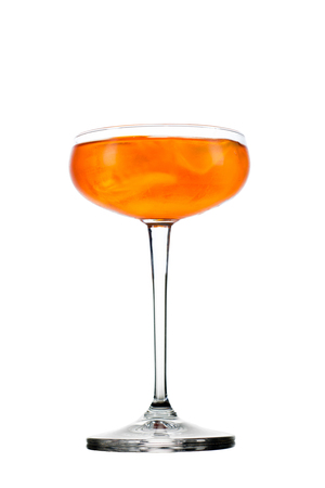 Fresh cold summer cocktail glass of aperol spritz cocktail isolated on white background.の写真素材