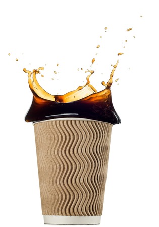 disposable paper cup with coffee splash isolated on white background. Package for drinksの写真素材