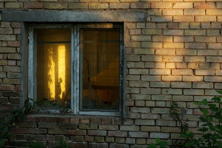 old dirty window on old dirty wall.の写真素材
