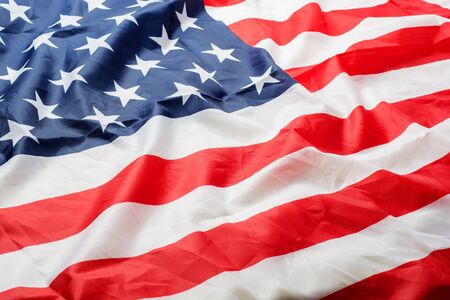 Beautifully waving star and striped American flagの写真素材