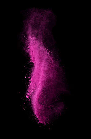 Launched colorful powder, isolated on black backgroundの写真素材