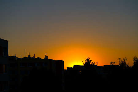 Yellow and orange sunrise under the city  Prague, Czech republic の写真素材