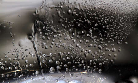 ice cleavage surface with bubblesの写真素材