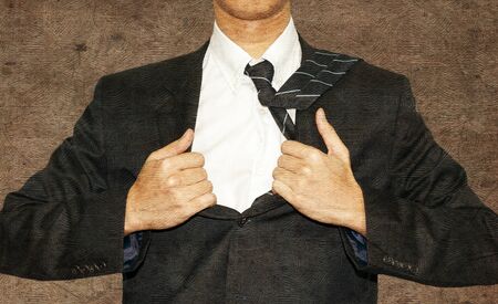 Business take off the black suit on retro styleの写真素材