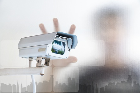 Security Camera or CCTV on digital background