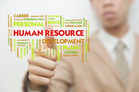 Business man pressing touch screen on Background wording conceptの写真素材