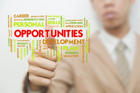 Business man pressing touch screen on Background wording conceptの写真素材