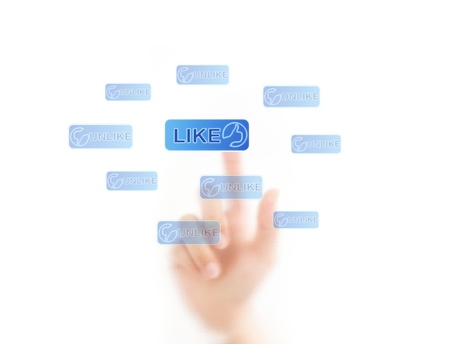 finger pressing Social Network icon on like buttonの写真素材