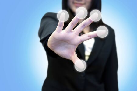 Business woman with hand pointing on touch screen の写真素材