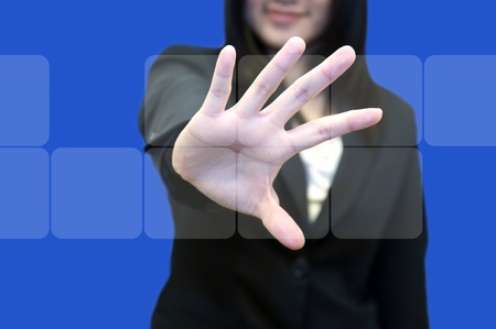 Business woman with hand holding touch screenの写真素材