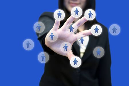 Business woman with hand holding touch screenの写真素材