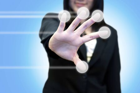 Business woman with hand pointing on touch screen の写真素材