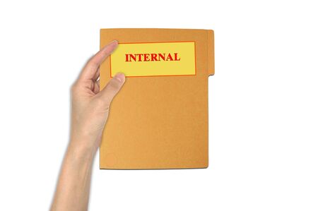 Hand holding internal paper folderの写真素材