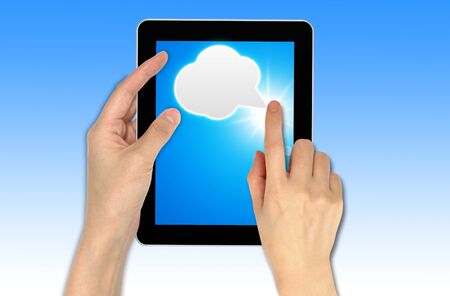a male hand holding a touch screen, cloud computing concept technologyの写真素材