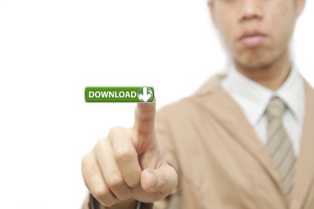 Business man press finger on green download buttonの写真素材