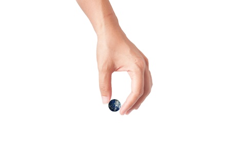 Hand with earth globe isolated on white backgroundの写真素材