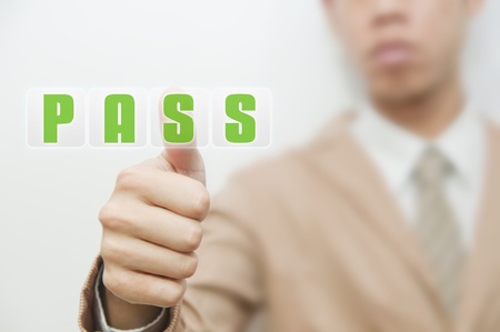 Business man shows thumb up and access authorization conceptの写真素材