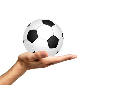 Soccer ball on a white background and handの写真素材