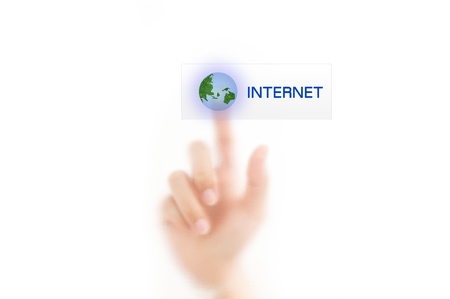 man finger pressing a touchscreen internetの写真素材
