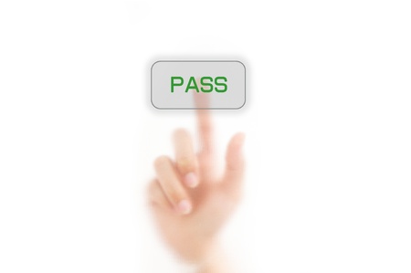 man finger pressing a touchscreen on pass buttonの写真素材