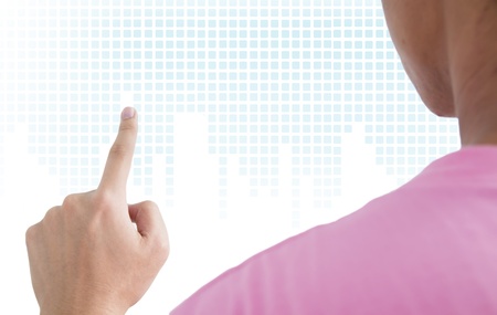 Man point finger on the screenの写真素材