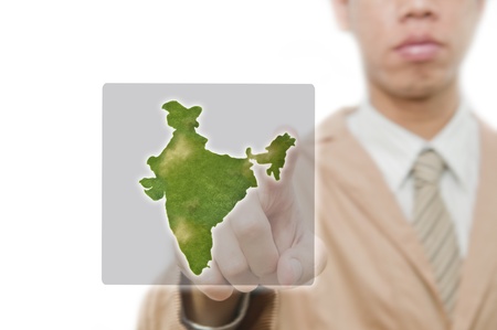 Businessman point finger on india map with embeded flagの写真素材