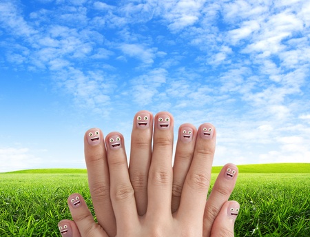 Smiling finger group over the blue sky background for Social network conceptの写真素材