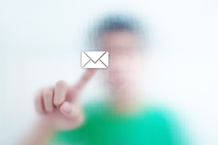 Human finger pressing Social Network icon email buttonの写真素材