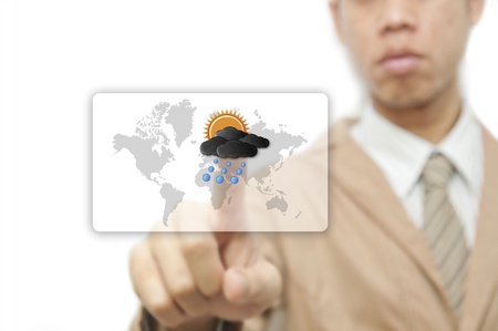 Businessman pressing finger on weather forecast buttonの写真素材
