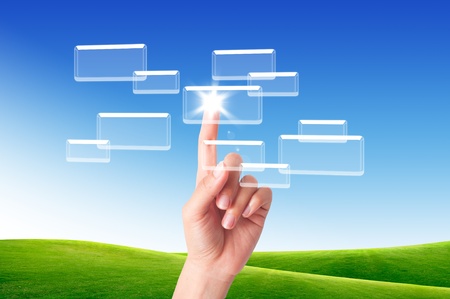 Business man pressing button on the digital screen  background
