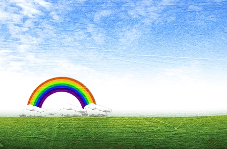 Beautiful landscape on green grass over the blue sky backgroundの写真素材