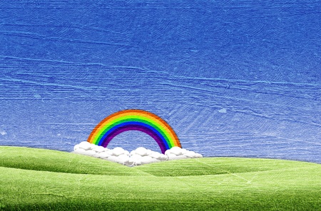 Beautiful landscape on green grass over the blue sky backgroundの写真素材