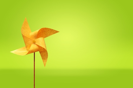 Colorful windmaill toy on the screen background, for ecology idea and conceptの写真素材