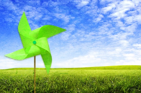 Colorful windmaill toy on the screen background, for ecology idea and conceptの写真素材