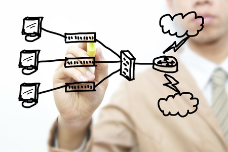 Business man draw network diagram on the screen backgroundの写真素材