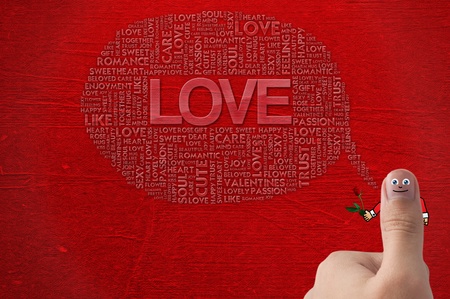 Smiled Thumb up with hand holding rose , for valentineの写真素材