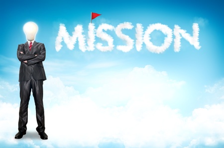 A business man bulb standing over road and blue sky the backgroundの写真素材