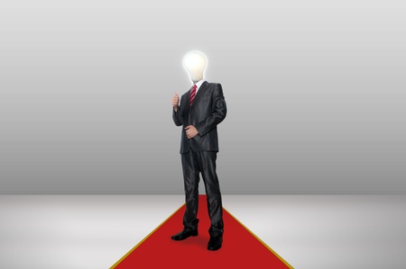 A business man bulb standing in the gallery roomの写真素材