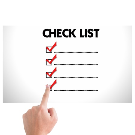 Hand with mark on the check boxes.の写真素材