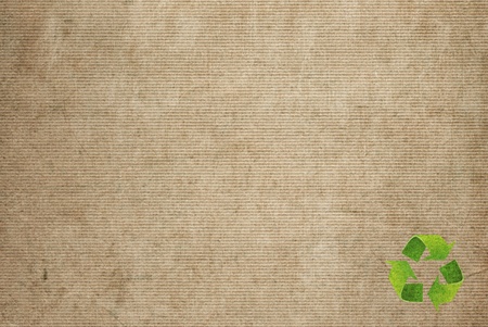 Recycle symbol on the Paper texture backgroundの写真素材