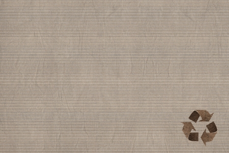 Recycle symbol on the Paper texture backgroundの写真素材