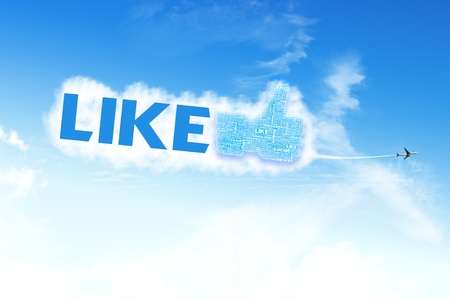 Thumb up like hand symbol with tag cloud of word on the skyの写真素材