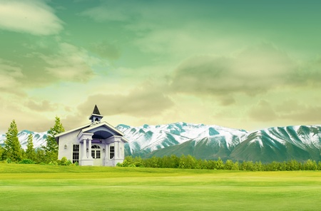House on green field landscape with skyの写真素材